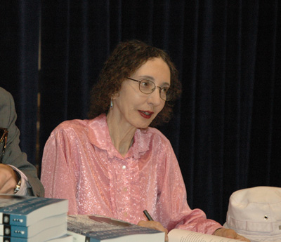 Photo of Joyce Carol Oates signing books