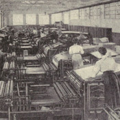 Photo of 19th century women feeding printing press